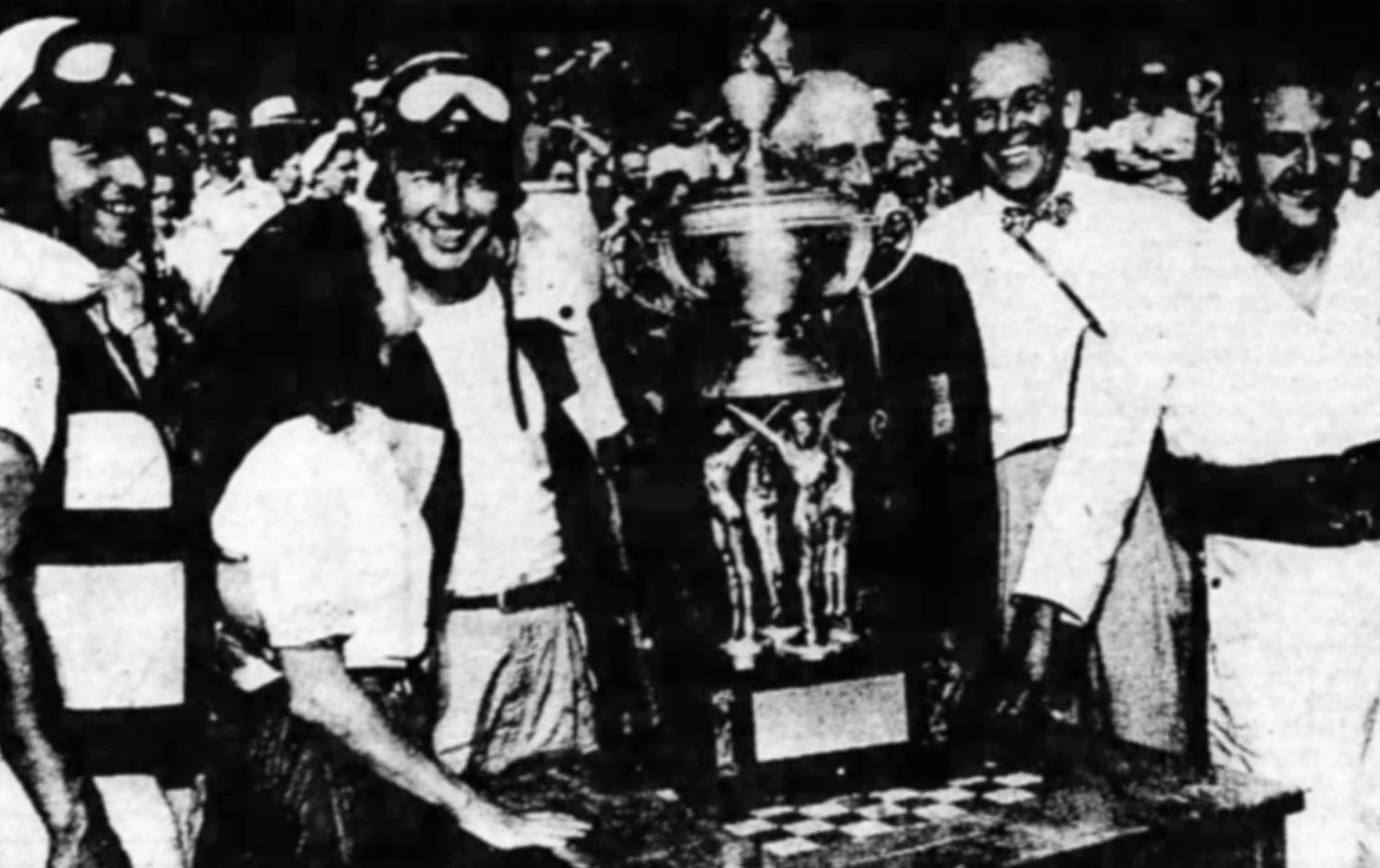 Dan Arena receives the 1948 Percy Jones Trophy at Gull Lake