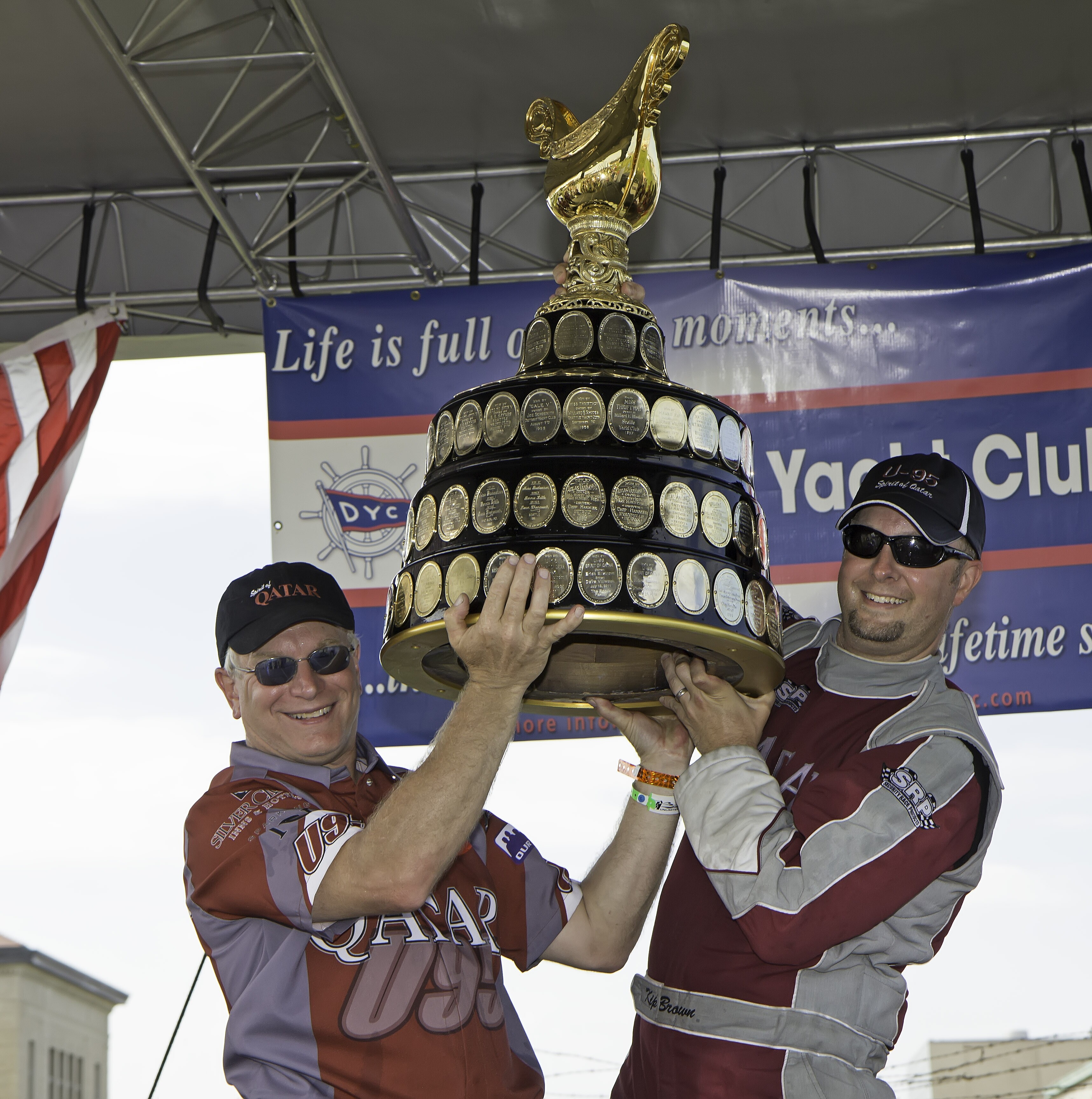 Nate Brown (L) and Kip Brown(R) hoist the Gold Cup. Photo by Chris Denslow – H1