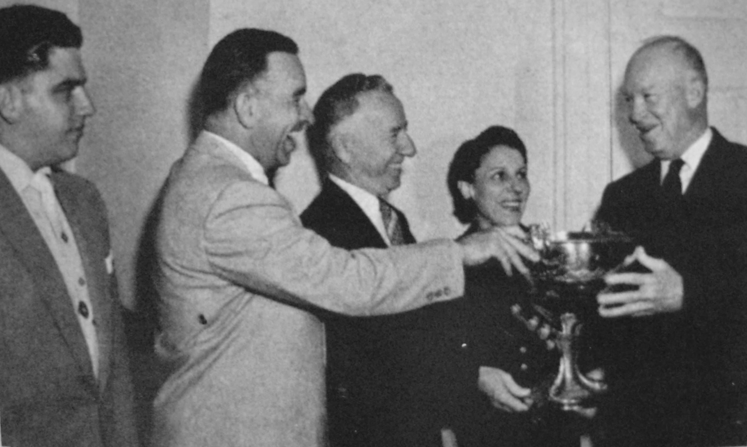 “Wild” Bill Cantrell, Joe and Millie Schoenith being presented
the President’s Cup by President Dwight D. Eisenhower