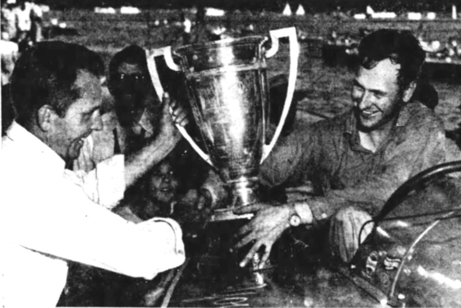 Bob Rowland of Portsmouth, Va., receiving the Marine Derby Trophy